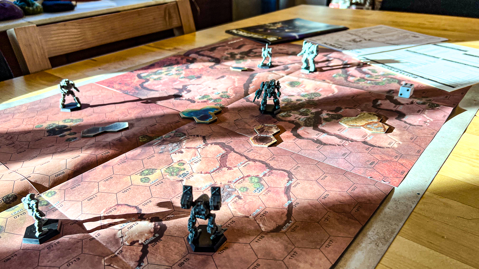 A photo of a game of Battletech