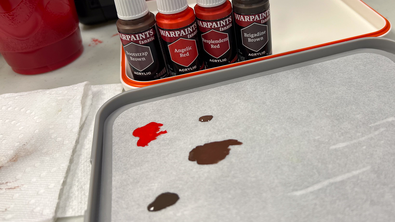 A photo of the fanatics paint on a wet palette