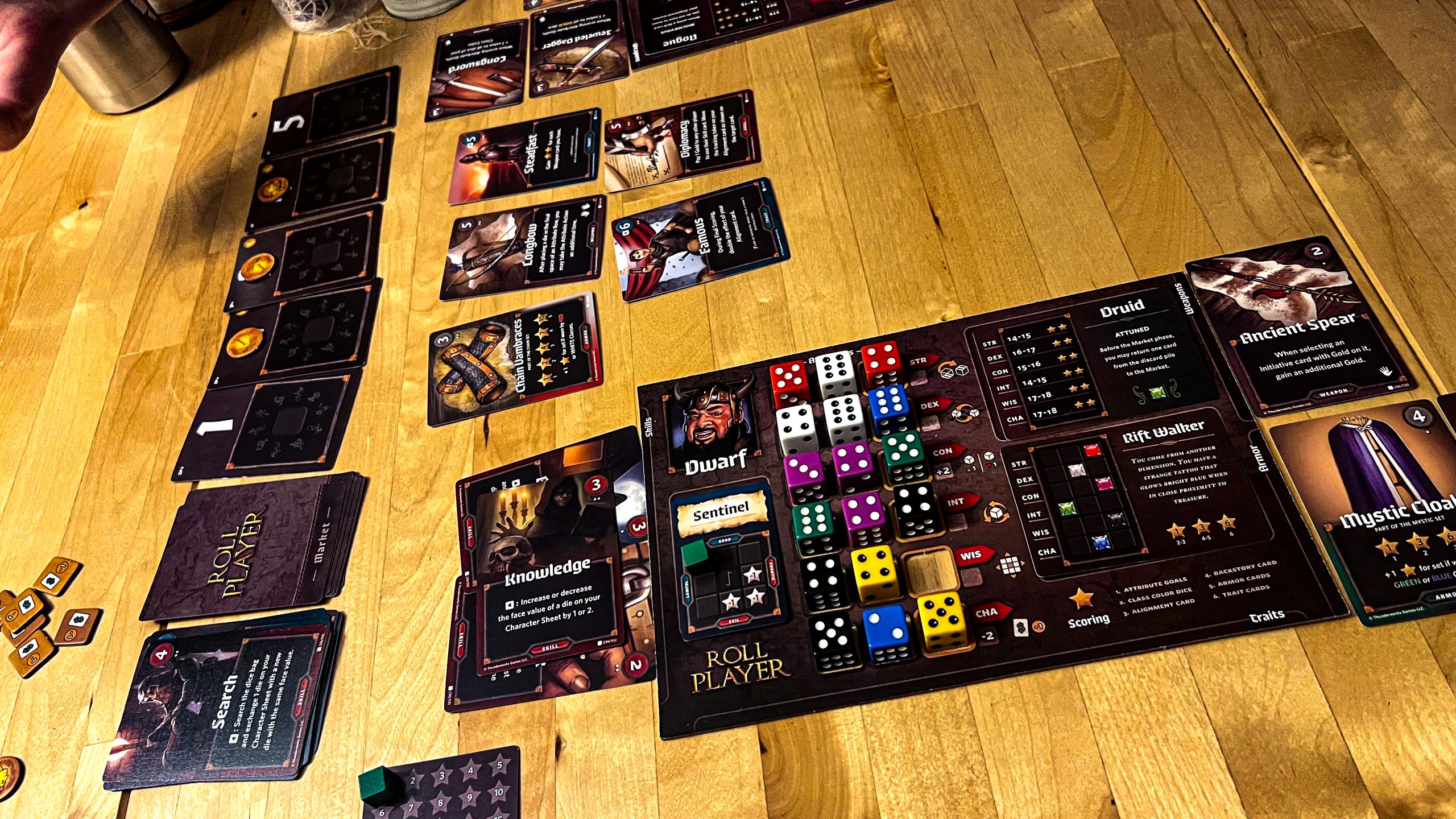 A photo showing a nearly full character sheet for the game Roll Player