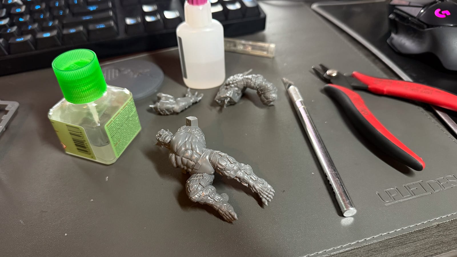 A photo of a marvel crisis protocol miniature in sub assembly