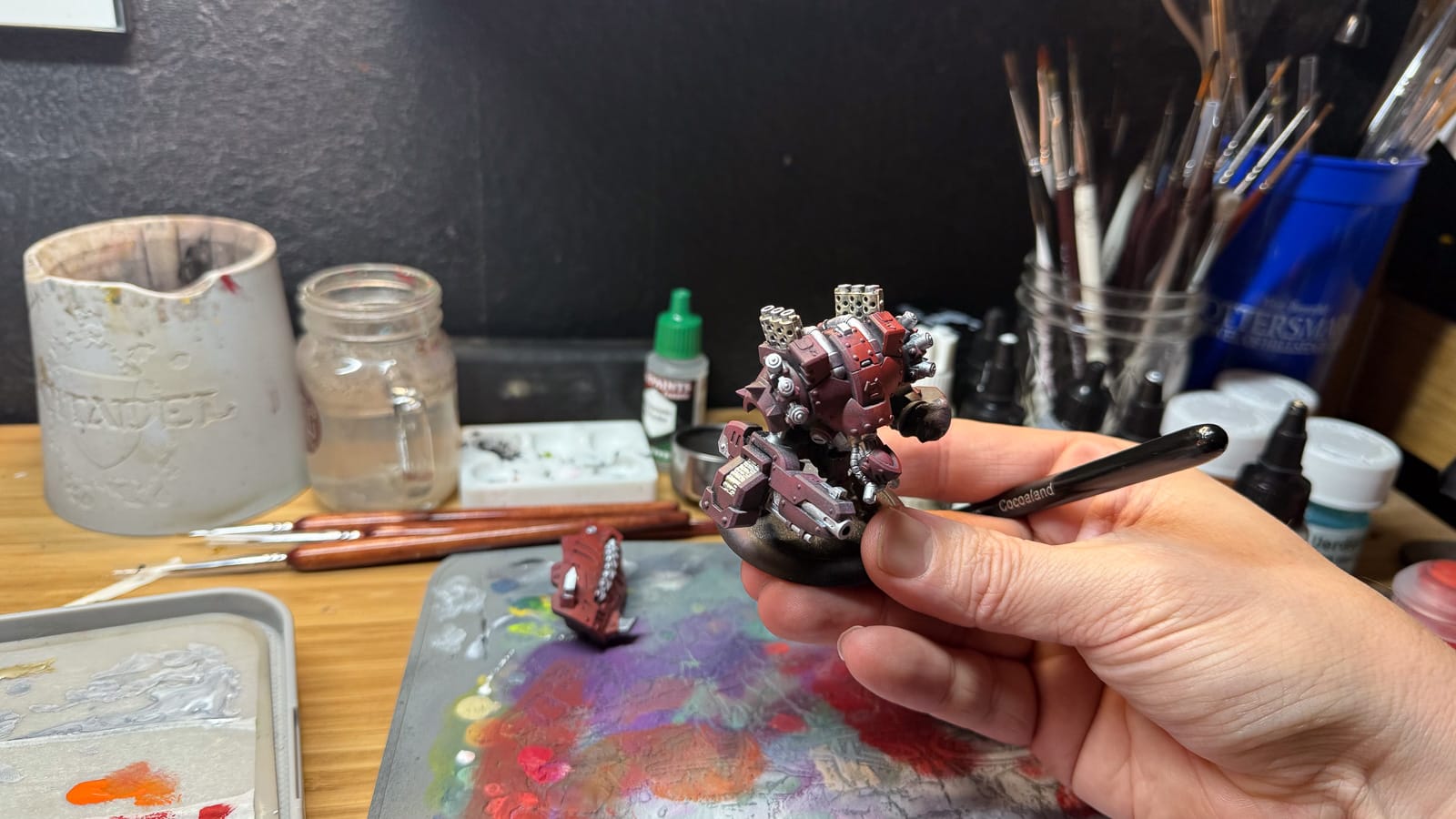 A photo of a Warmachine model being painted