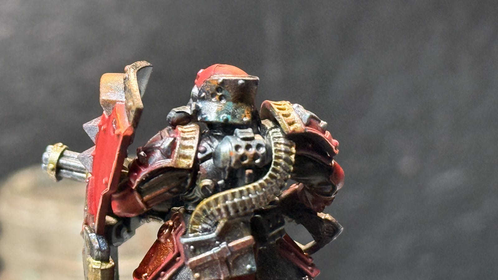 A zoomed in photo of a Warmachine model showing rust