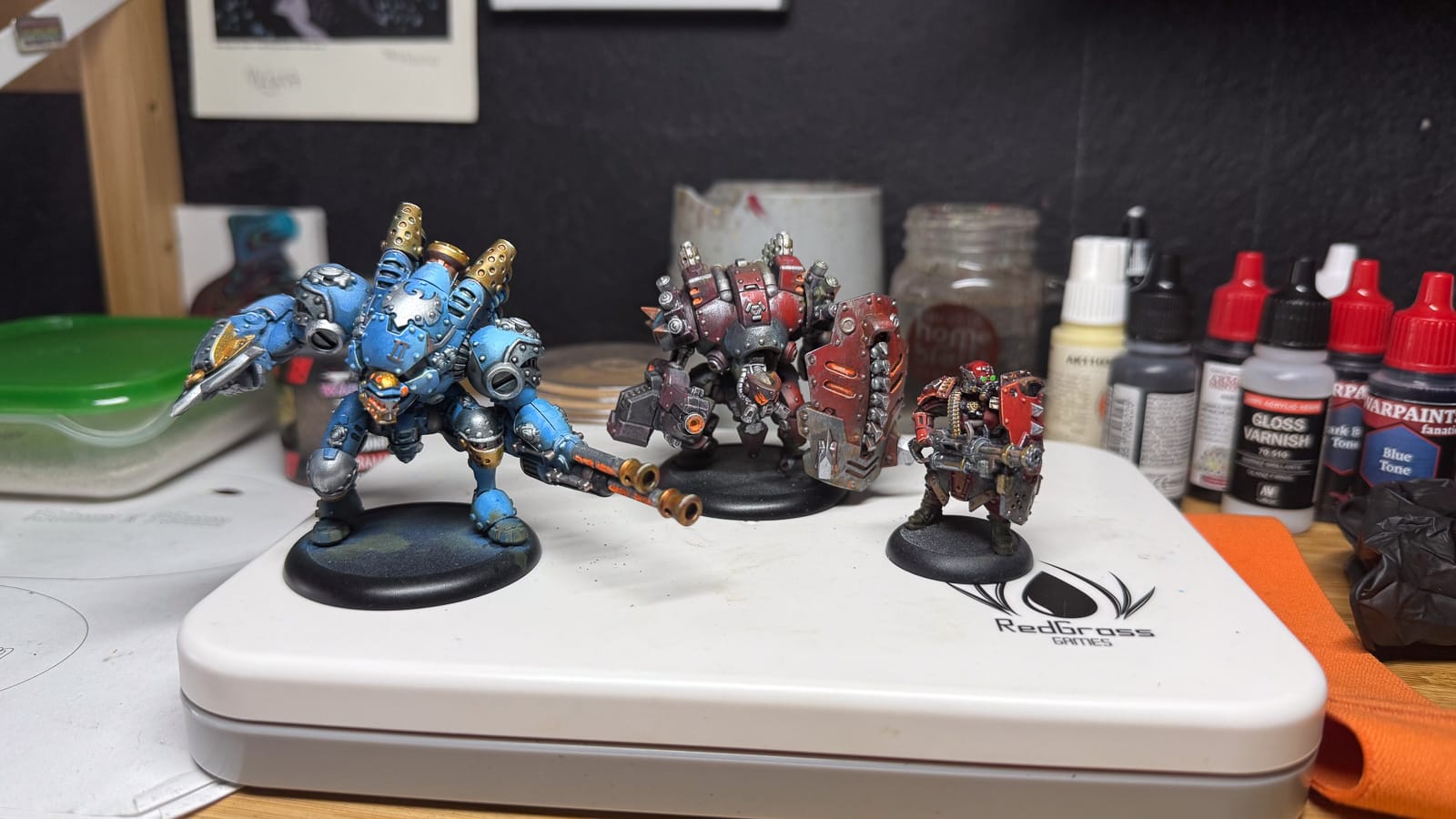 A photo of 3 warmachine models