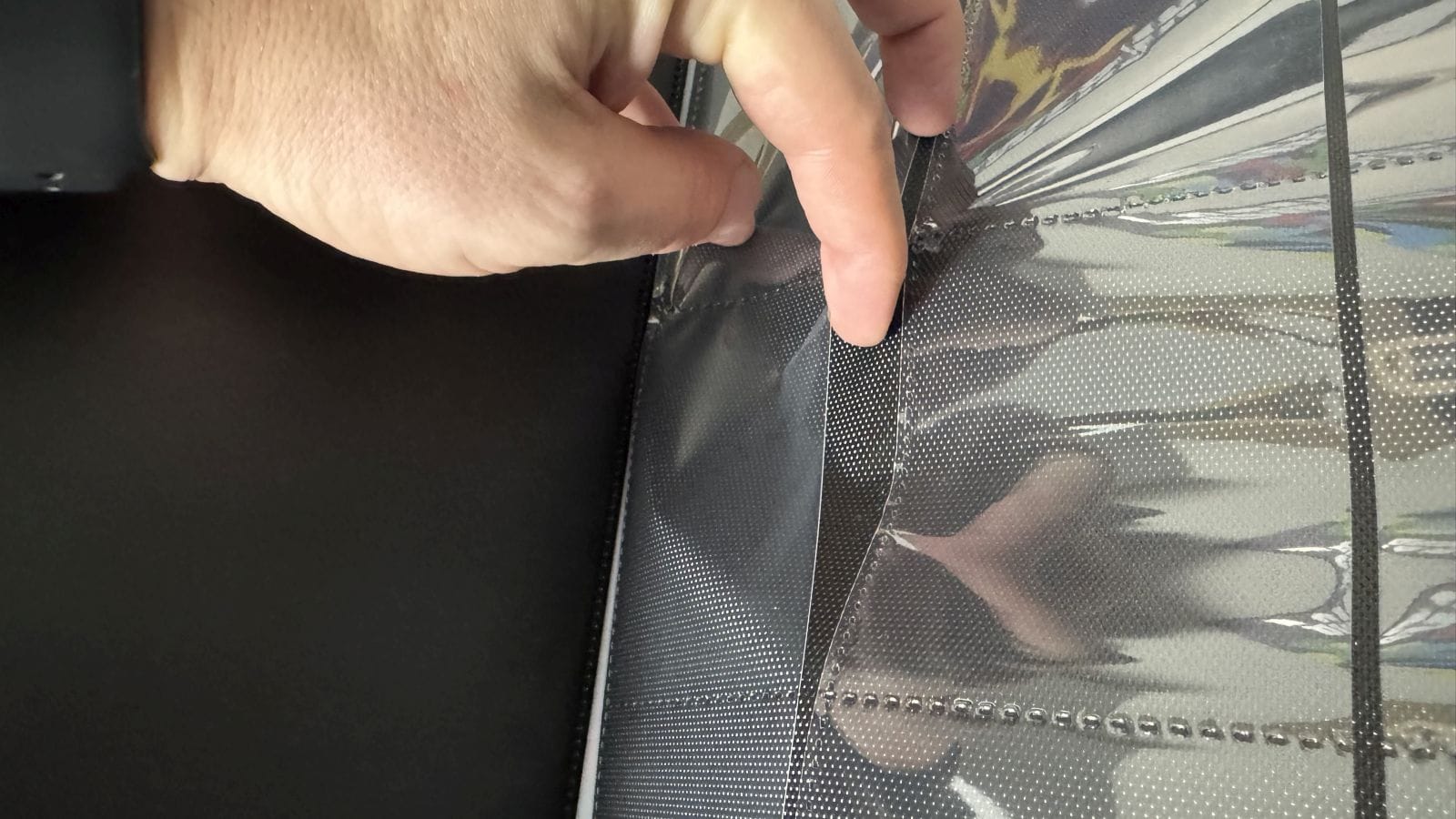 This picture shows the side opening pockets within the Lorcana card portfolio.