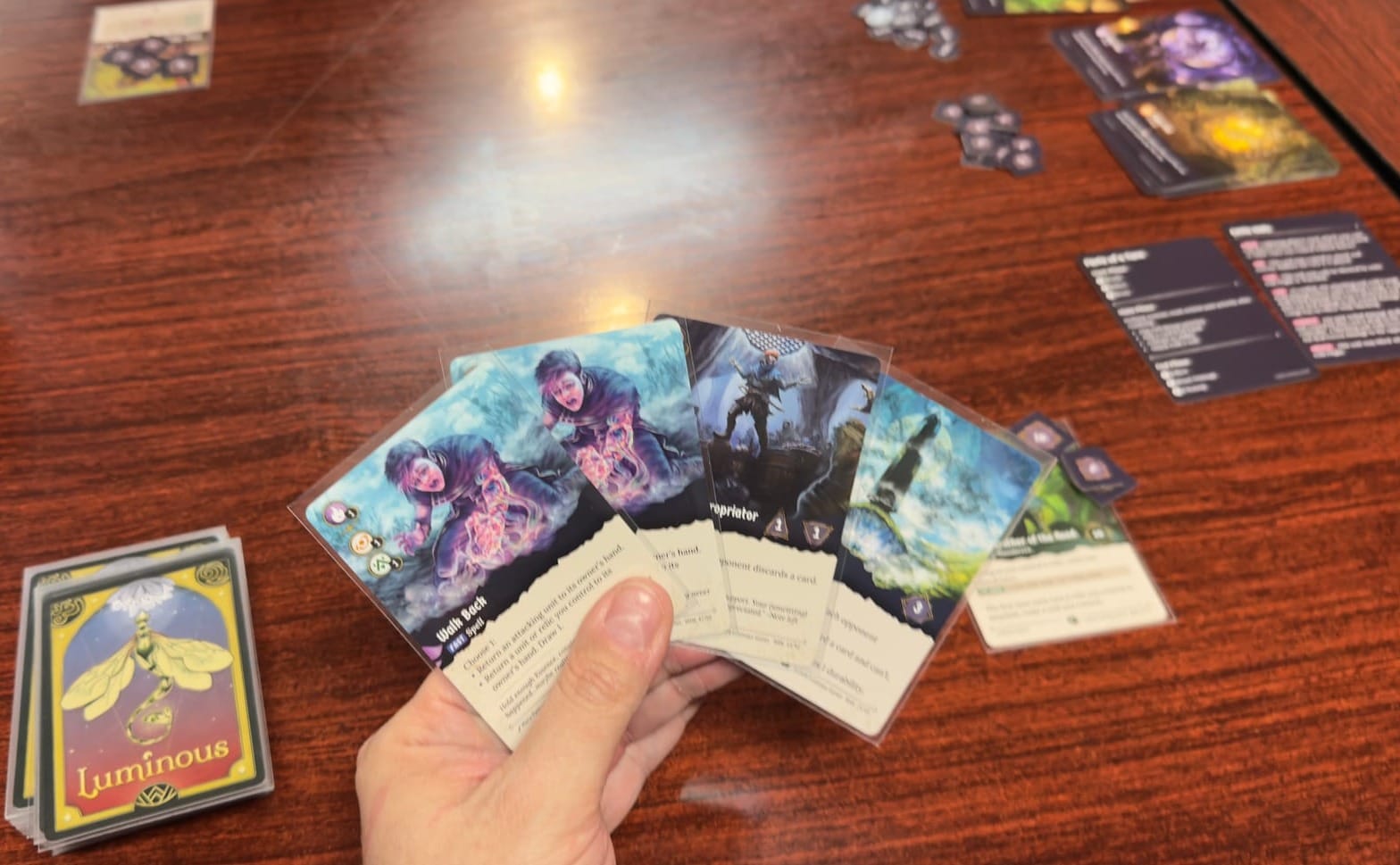 Luminous' card design is crisp and easy to understand. The artwork is great too!
