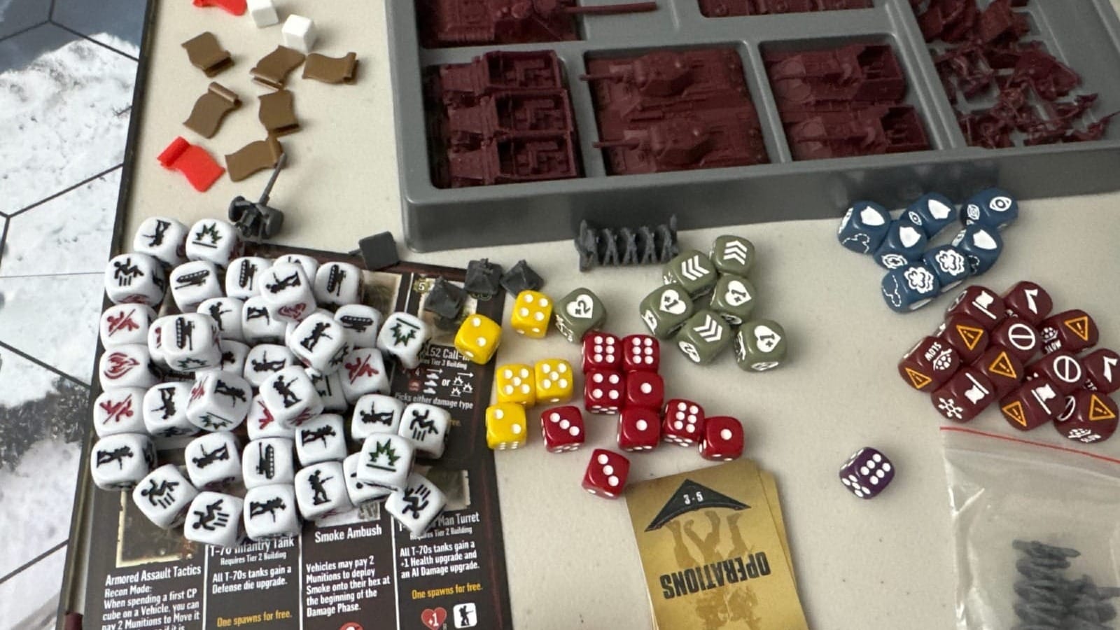 A large pile of dice used in the game.