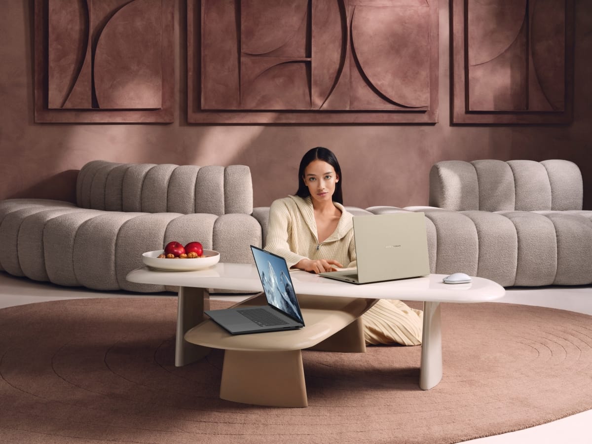 The Zenbook A16 in grey and beige.