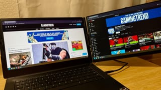 Cevaton P5 mounted on a Razer Blade 14" with the GamingTrend website on one monitor and the GamingTrend YouTube channel on another.