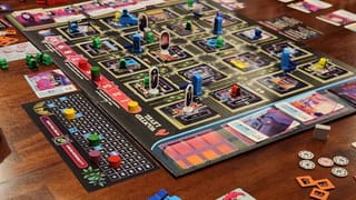 A board showing a city grid with police, snitches, kingpins, and goons all trying to vie for territory.
