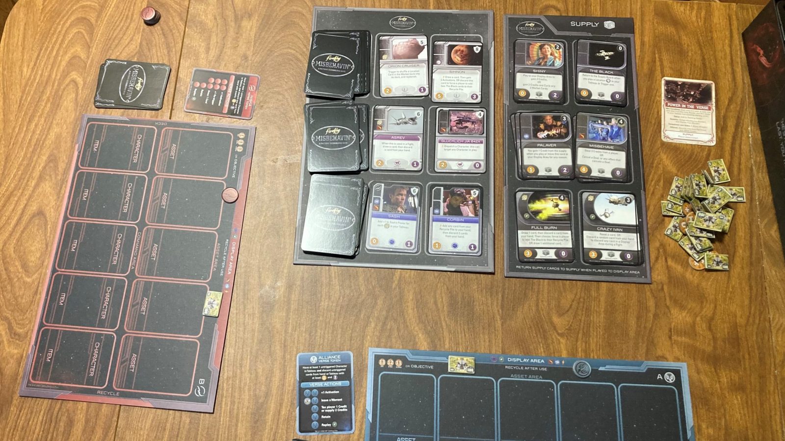 Firefly: Misbehavin' two-player setup with market and supply cards