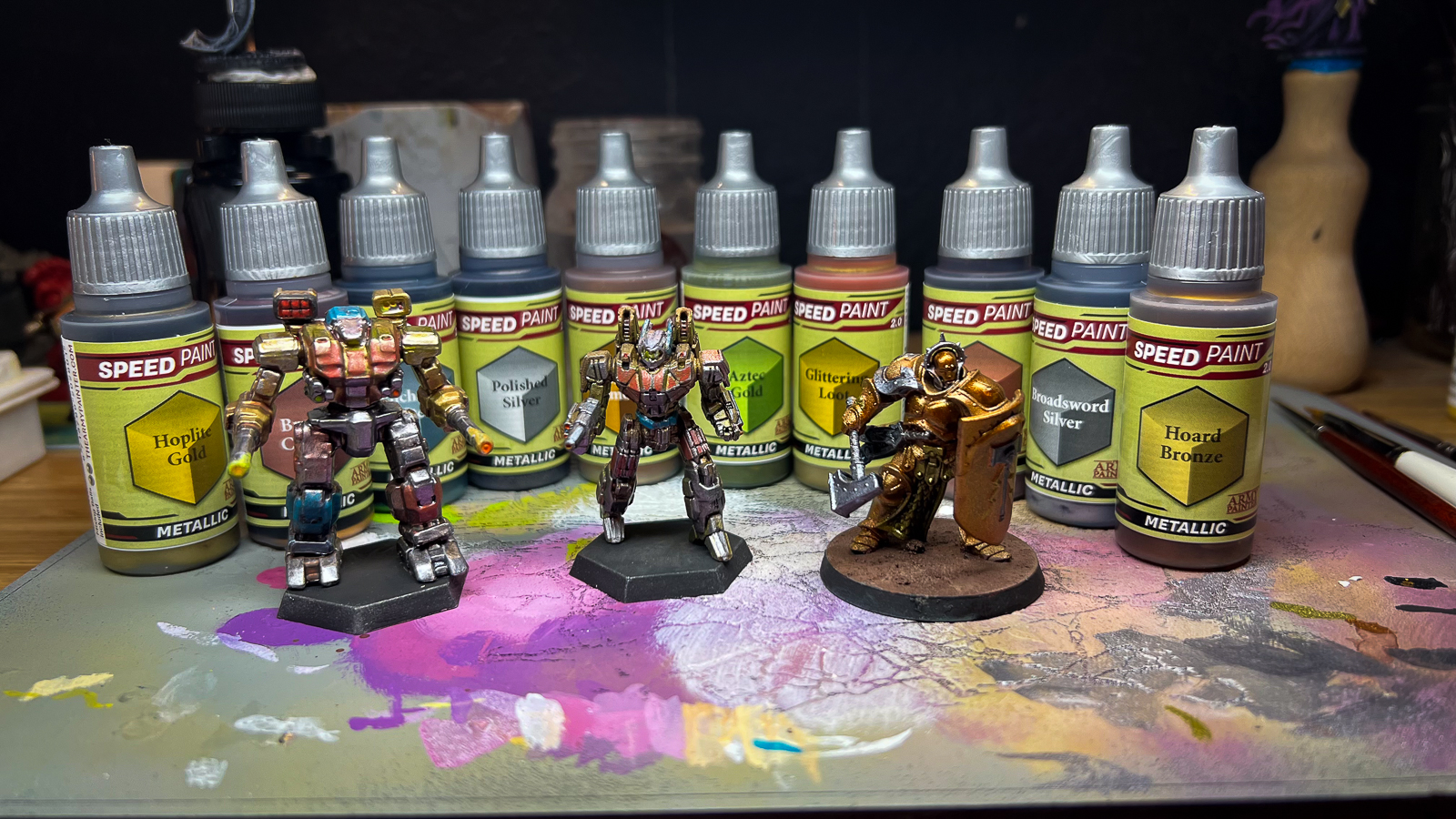 A set of finished models painted with metallic paints