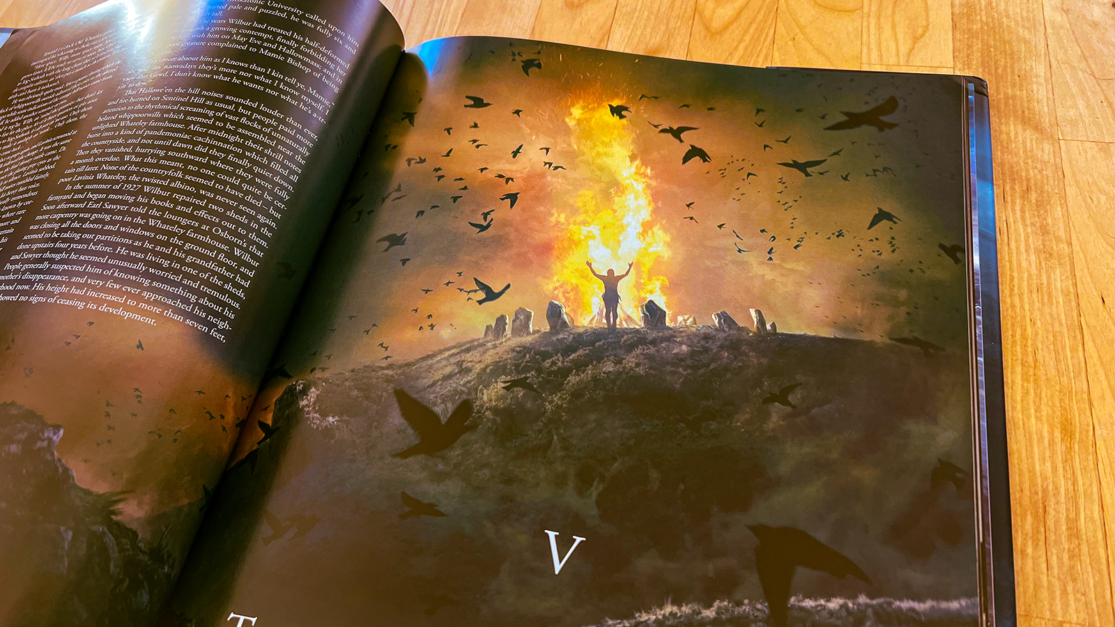 An image of the artwork of The Dunwich Horror depicting a bonfire surrounded by dark birds