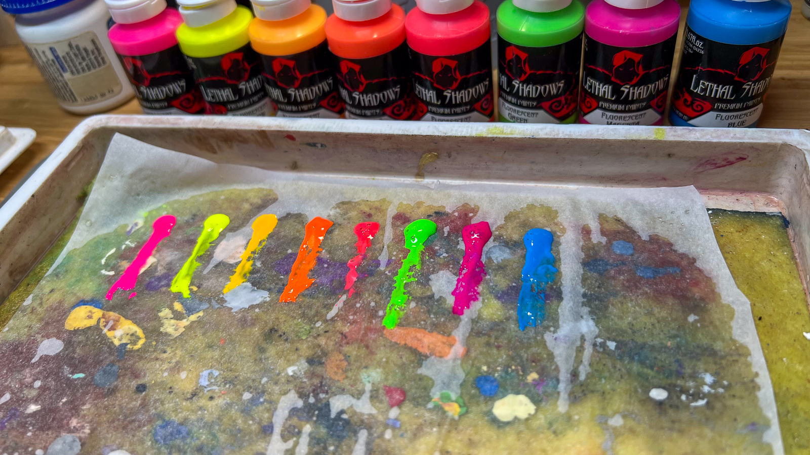 A photo of lethal shadows paints on a wet palette